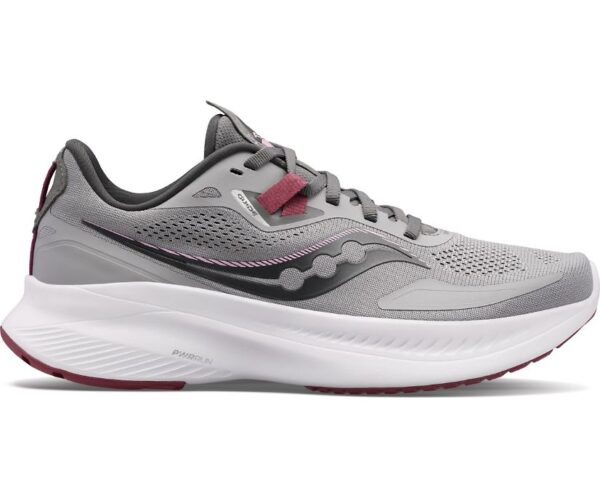 Side view of a WOMEN'S GUIDE 15 Alloy-Quartz running shoe with a chunky sole and red accents on the laces and logo.